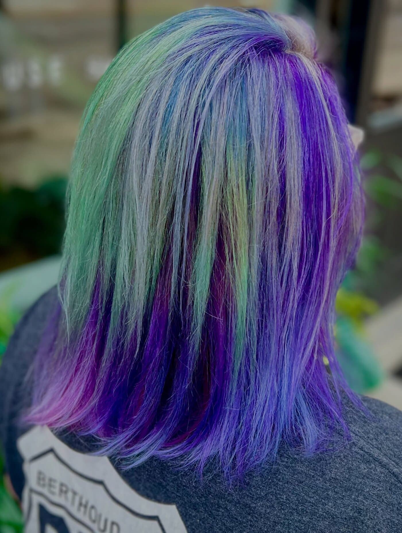 Vivid creative color — green, teal, and violet melt