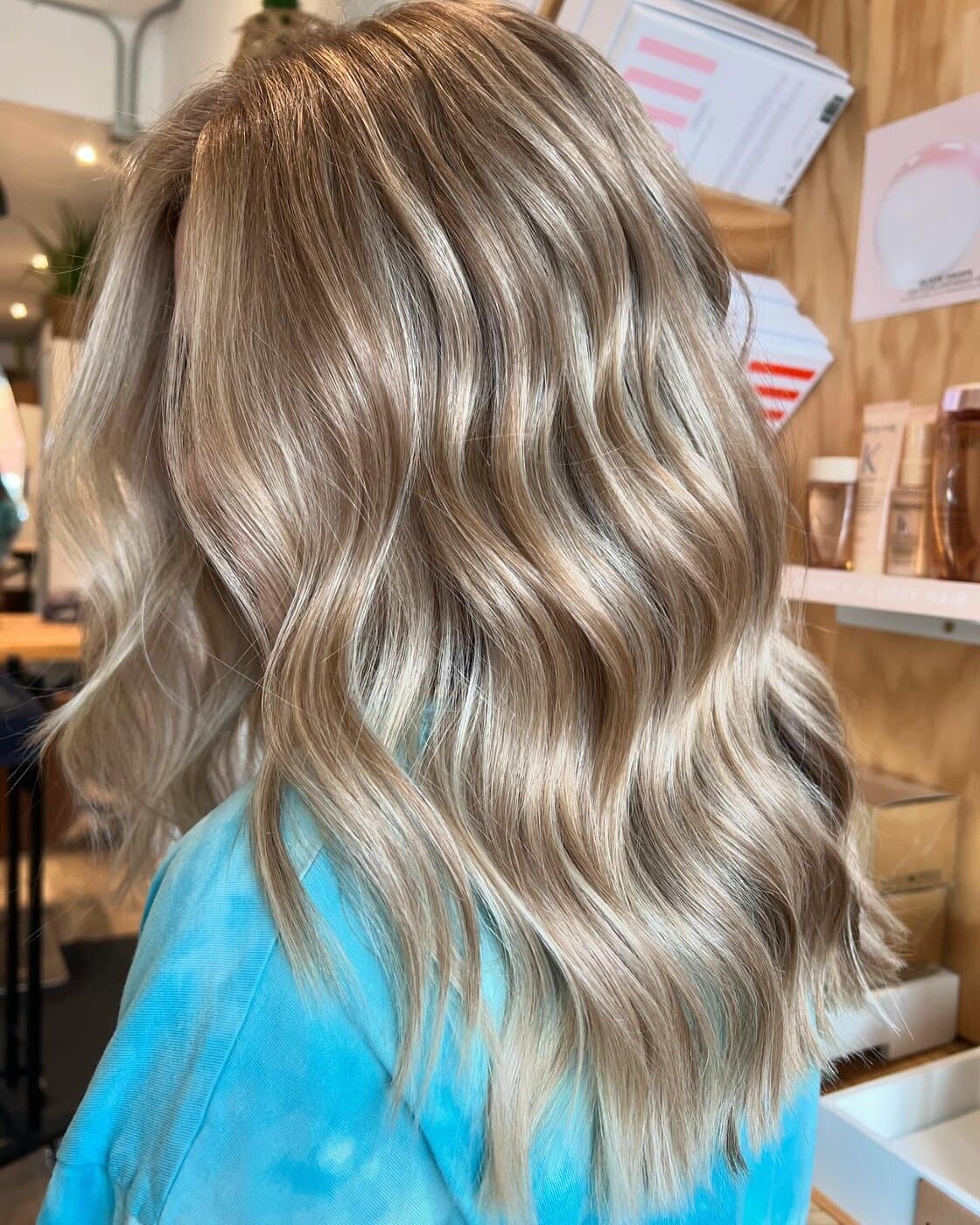 Bright blonde balayage with beachy waves