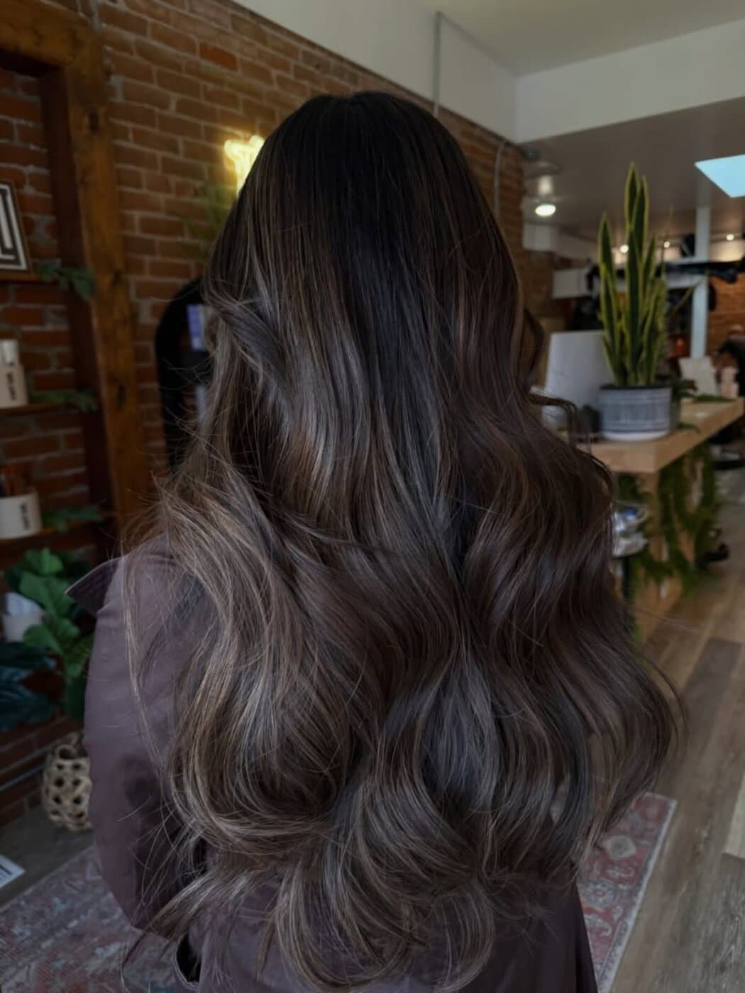 Dimensional brunette balayage with soft waves